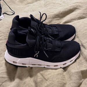 On Cloudnova Women’s Running Black and White Athletic Shoes